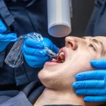 a man is getting detal treatment
