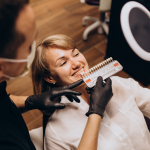 a woman is getting dental treatment